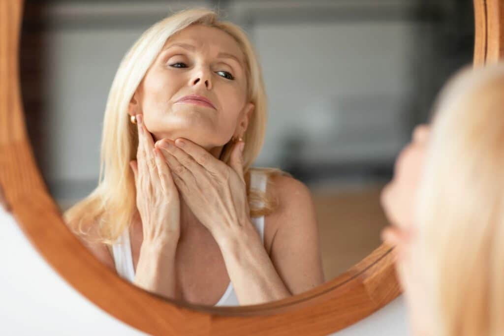 Woman looking at her reflection